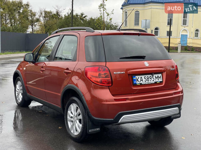 Сузуки СХ4 2012 в Буче на Automoto.ua Оранжевый Сузуки СХ4, объемом двигателя 2 л и пробегом 180 тыс. км за 8700 $, фото 10 на Automoto.ua