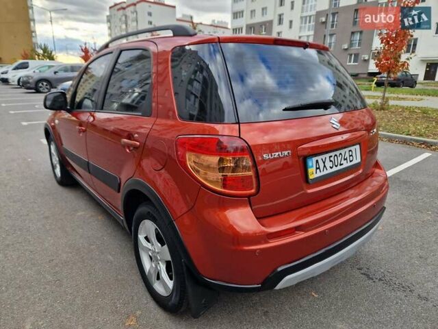 Помаранчевий Сузукі СХ4, об'ємом двигуна 1.6 л та пробігом 88 тис. км за 11200 $, фото 17 на Automoto.ua