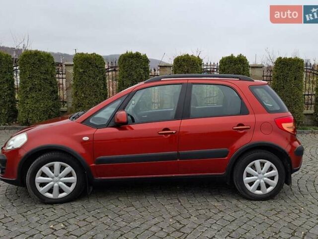 Оранжевый Сузуки СХ4, объемом двигателя 1.6 л и пробегом 85 тыс. км за 11200 $, фото 1 на Automoto.ua