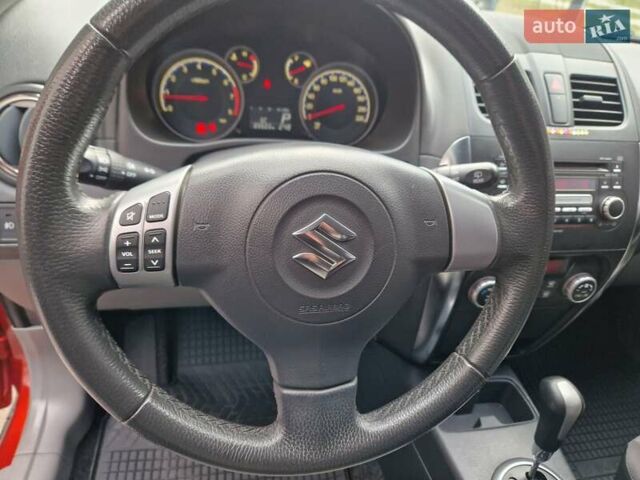 Помаранчевий Сузукі СХ4, об'ємом двигуна 1.6 л та пробігом 88 тис. км за 11200 $, фото 56 на Automoto.ua