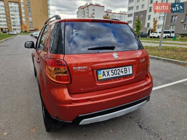 Помаранчевий Сузукі СХ4, об'ємом двигуна 1.6 л та пробігом 88 тис. км за 11200 $, фото 20 на Automoto.ua
