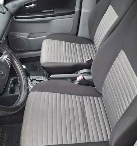 Оранжевый Сузуки СХ4, объемом двигателя 1.6 л и пробегом 85 тыс. км за 11200 $, фото 6 на Automoto.ua