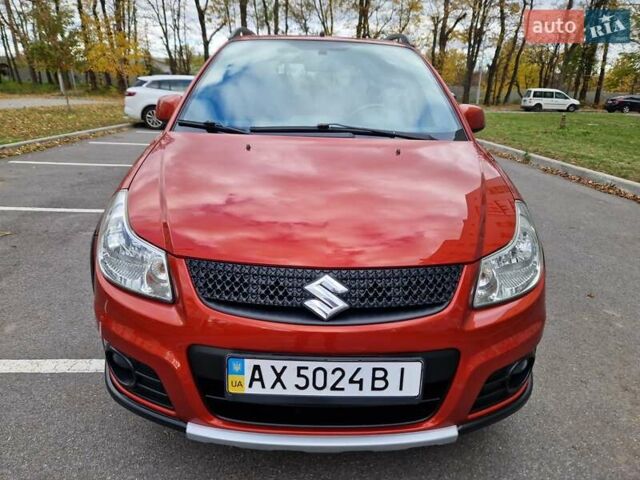 Помаранчевий Сузукі СХ4, об'ємом двигуна 1.6 л та пробігом 88 тис. км за 11200 $, фото 28 на Automoto.ua