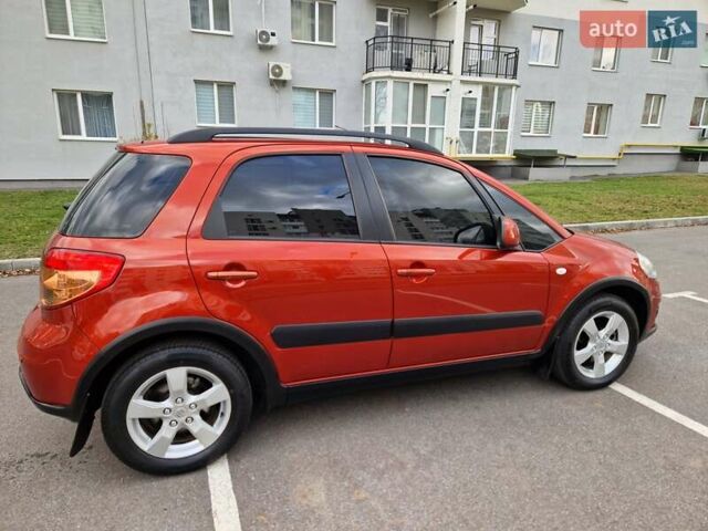 Помаранчевий Сузукі СХ4, об'ємом двигуна 1.6 л та пробігом 88 тис. км за 11200 $, фото 18 на Automoto.ua