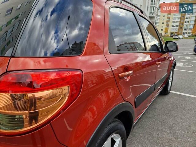 Помаранчевий Сузукі СХ4, об'ємом двигуна 1.6 л та пробігом 88 тис. км за 11200 $, фото 42 на Automoto.ua