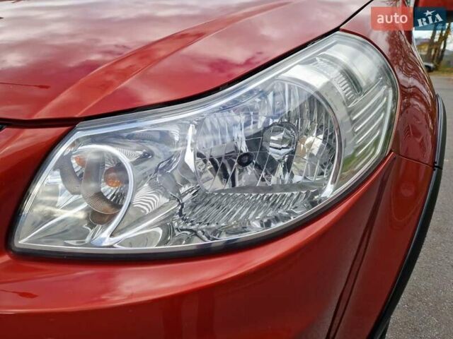 Помаранчевий Сузукі СХ4, об'ємом двигуна 1.6 л та пробігом 88 тис. км за 11200 $, фото 31 на Automoto.ua