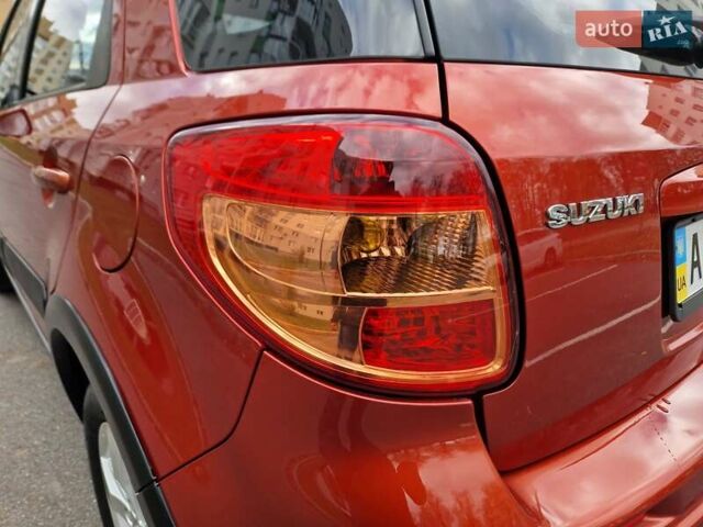 Помаранчевий Сузукі СХ4, об'ємом двигуна 1.6 л та пробігом 88 тис. км за 11200 $, фото 36 на Automoto.ua