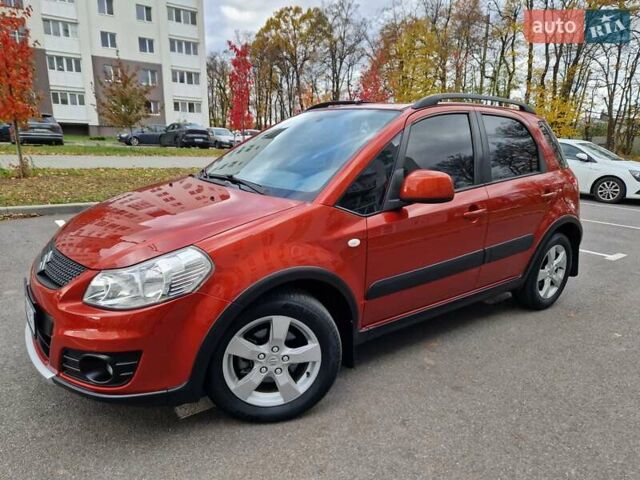 Помаранчевий Сузукі СХ4, об'ємом двигуна 1.6 л та пробігом 88 тис. км за 11200 $, фото 9 на Automoto.ua