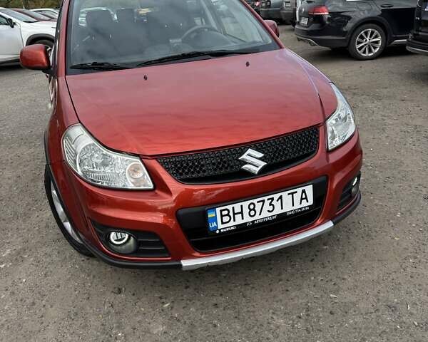 Сузуки СХ4 2013 в Одессе на Automoto.ua Оранжевый Сузуки СХ4, объемом двигателя 1.59 л и пробегом 78 тыс. км за 11000 $, фото 10 на Automoto.ua