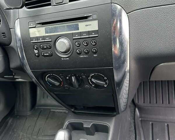 Оранжевый Сузуки СХ4, объемом двигателя 1.59 л и пробегом 136 тыс. км за 9900 $, фото 12 на Automoto.ua