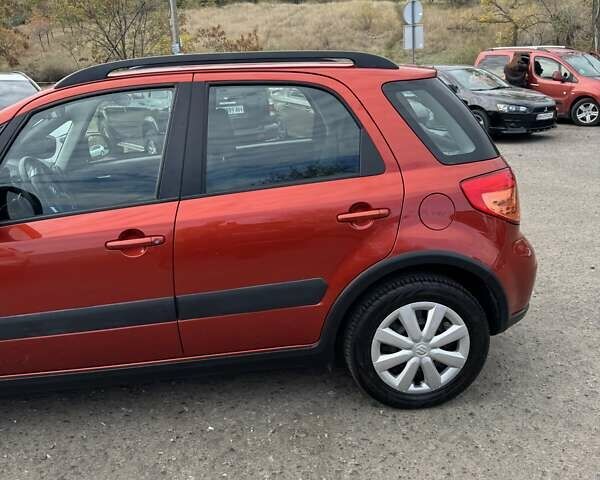 Сузуки СХ4 2013 в Одессе на Automoto.ua Оранжевый Сузуки СХ4, объемом двигателя 1.59 л и пробегом 78 тыс. км за 11000 $, фото 1 на Automoto.ua