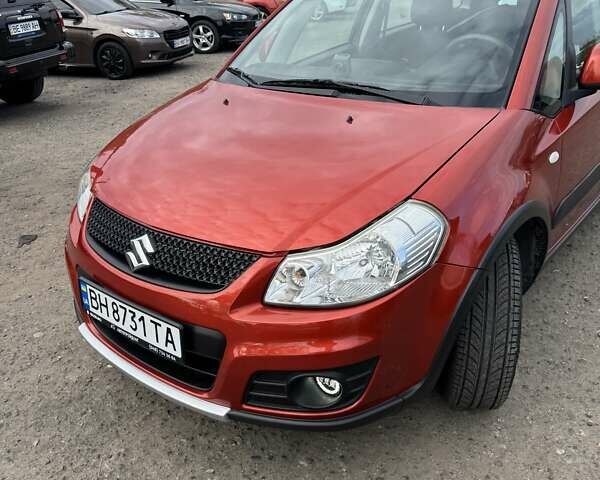 Сузуки СХ4 2013 в Одессе на Automoto.ua Оранжевый Сузуки СХ4, объемом двигателя 1.59 л и пробегом 78 тыс. км за 11000 $, фото 3 на Automoto.ua