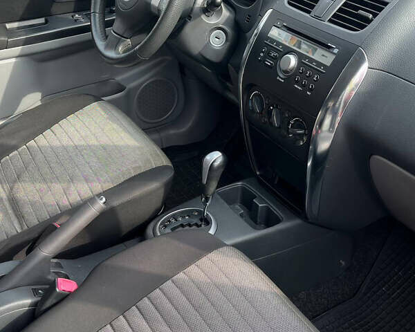 Сузукі СХ4 2013 у Кривому Розі на Automoto.ua Помаранчевий Сузукі СХ4, об'ємом двигуна 1.6 л та пробігом 138 тис. км за 9300 $, фото 12 на Automoto.ua