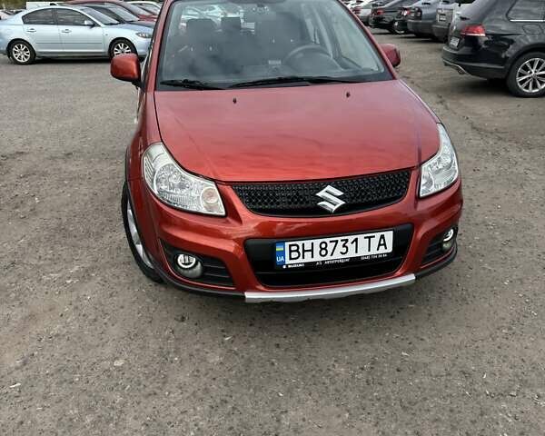 Сузуки СХ4 2013 в Одессе на Automoto.ua Оранжевый Сузуки СХ4, объемом двигателя 1.59 л и пробегом 78 тыс. км за 11000 $, фото 5 на Automoto.ua