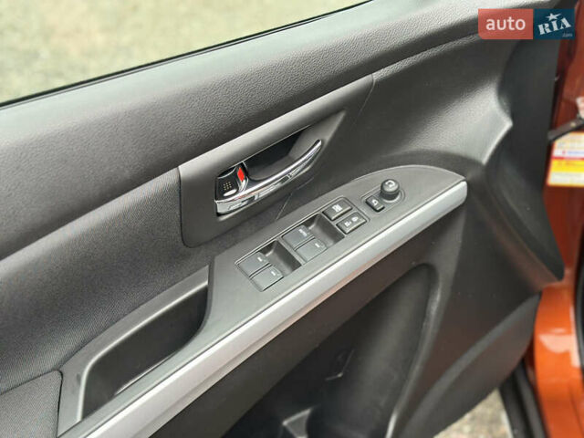 Помаранчевий Сузукі СХ4, об'ємом двигуна 1.37 л та пробігом 62 тис. км за 18900 $, фото 14 на Automoto.ua