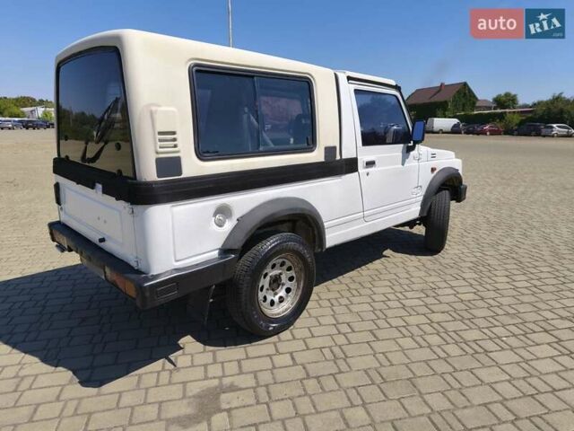 Белый Сузуки Самурай, объемом двигателя 1.3 л и пробегом 95 тыс. км за 7500 $, фото 2 на Automoto.ua