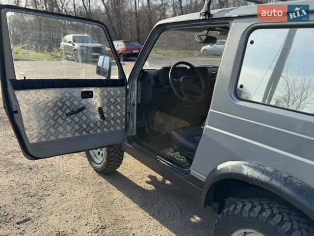 Синий Сузуки Самурай, объемом двигателя 1.3 л и пробегом 60 тыс. км за 4800 $, фото 1 на Automoto.ua