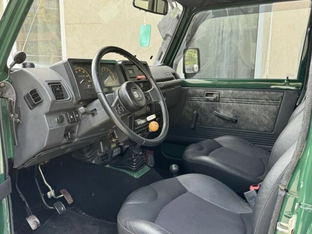 Зеленый Сузуки Самурай, объемом двигателя 1.3 л и пробегом 126 тыс. км за 12000 $, фото 7 на Automoto.ua