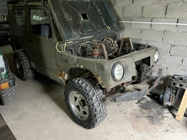 Зеленый Сузуки Самурай, объемом двигателя 1.3 л и пробегом 200 тыс. км за 5500 $, фото 2 на Automoto.ua