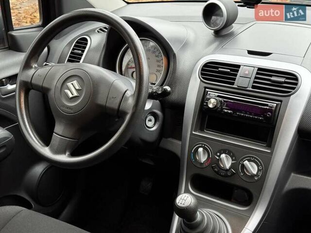 Червоний Сузукі Сплеш, об'ємом двигуна 1 л та пробігом 224 тис. км за 4990 $, фото 37 на Automoto.ua