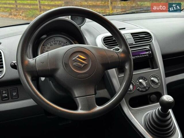 Червоний Сузукі Сплеш, об'ємом двигуна 1 л та пробігом 224 тис. км за 4990 $, фото 23 на Automoto.ua