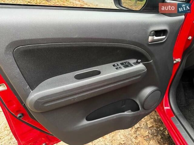 Червоний Сузукі Сплеш, об'ємом двигуна 1 л та пробігом 224 тис. км за 4990 $, фото 27 на Automoto.ua