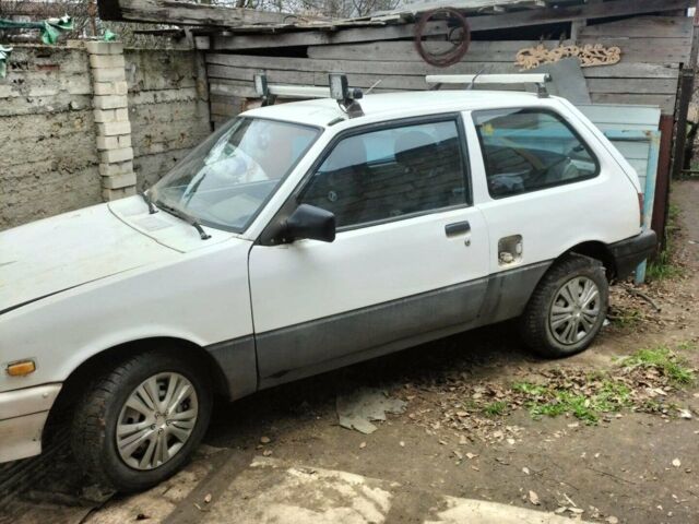 Білий Сузукі Свифт, об'ємом двигуна 1.3 л та пробігом 120 тис. км за 800 $, фото 6 на Automoto.ua