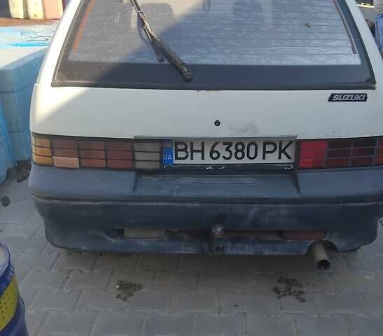 Белый Сузуки Свифт, объемом двигателя 1.3 л и пробегом 220 тыс. км за 550 $, фото 2 на Automoto.ua