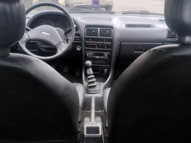 Белый Сузуки Свифт, объемом двигателя 1.3 л и пробегом 21 тыс. км за 500 $, фото 8 на Automoto.ua