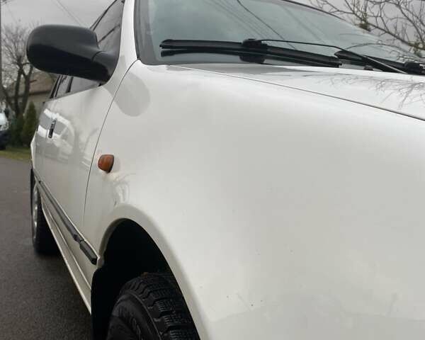 Белый Сузуки Свифт, объемом двигателя 1.3 л и пробегом 125 тыс. км за 950 $, фото 2 на Automoto.ua