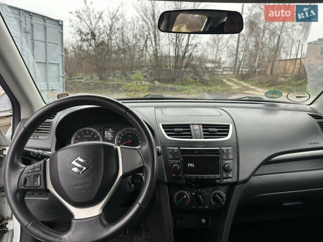 Белый Сузуки Свифт, объемом двигателя 1.24 л и пробегом 147 тыс. км за 5150 $, фото 10 на Automoto.ua