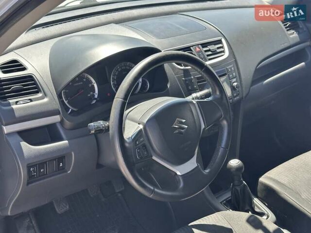 Білий Сузукі Свифт, об'ємом двигуна 1.25 л та пробігом 262 тис. км за 4990 $, фото 10 на Automoto.ua