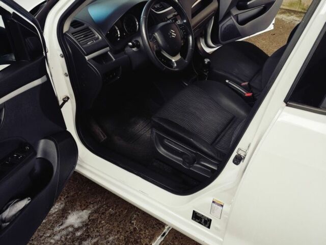 Білий Сузукі Свифт, об'ємом двигуна 1.2 л та пробігом 84 тис. км за 7199 $, фото 6 на Automoto.ua