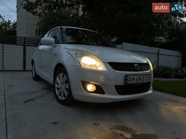 Білий Сузукі Свифт, об'ємом двигуна 1.25 л та пробігом 223 тис. км за 6700 $, фото 5 на Automoto.ua
