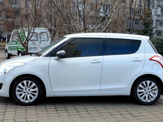 Білий Сузукі Свифт, об'ємом двигуна 1.2 л та пробігом 57 тис. км за 9900 $, фото 4 на Automoto.ua