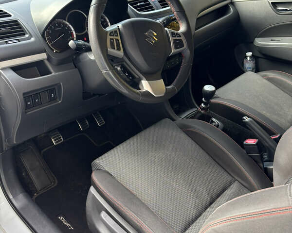 Сузуки Свифт 2014 в Киеве на Automoto.ua Белый Сузуки Свифт, объемом двигателя 1.6 л и пробегом 97 тыс. км за 7350 $, фото 23 на Automoto.ua