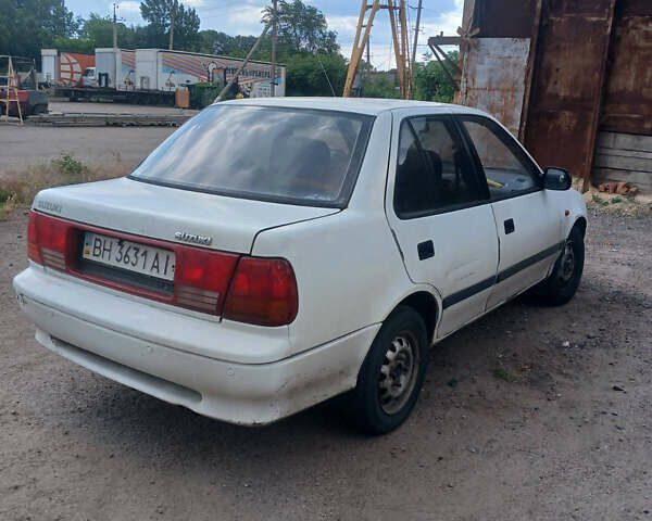 Белый Сузуки Свифт, объемом двигателя 1.3 л и пробегом 100 тыс. км за 500 $, фото 5 на Automoto.ua