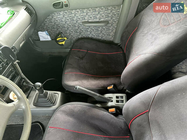 Белый Сузуки Свифт, объемом двигателя 1.3 л и пробегом 236 тыс. км за 2100 $, фото 8 на Automoto.ua