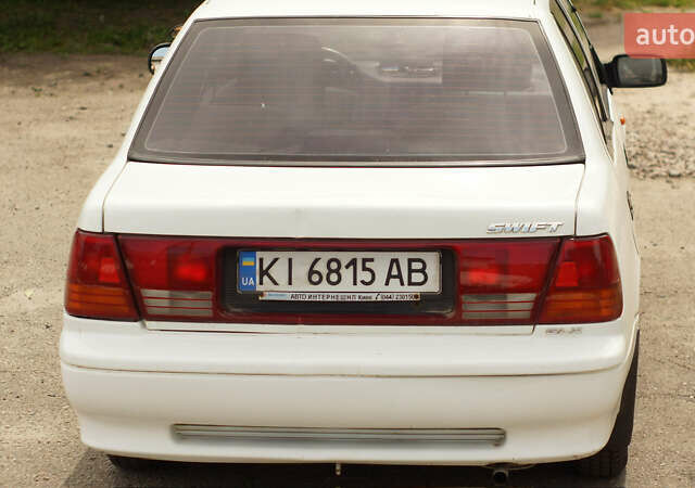 Белый Сузуки Свифт, объемом двигателя 1.3 л и пробегом 236 тыс. км за 2100 $, фото 1 на Automoto.ua