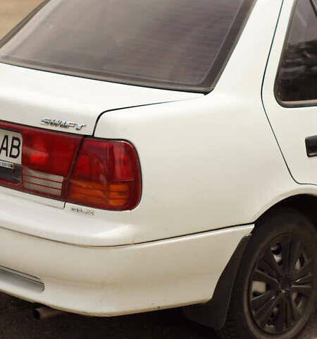 Белый Сузуки Свифт, объемом двигателя 1.3 л и пробегом 236 тыс. км за 2100 $, фото 2 на Automoto.ua