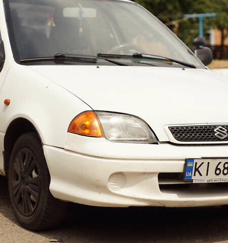 Белый Сузуки Свифт, объемом двигателя 1.3 л и пробегом 236 тыс. км за 2100 $, фото 3 на Automoto.ua