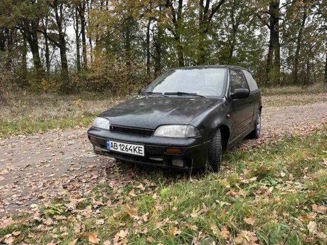 Чорний Сузукі Свифт, об'ємом двигуна 1.3 л та пробігом 320 тис. км за 500 $, фото 1 на Automoto.ua