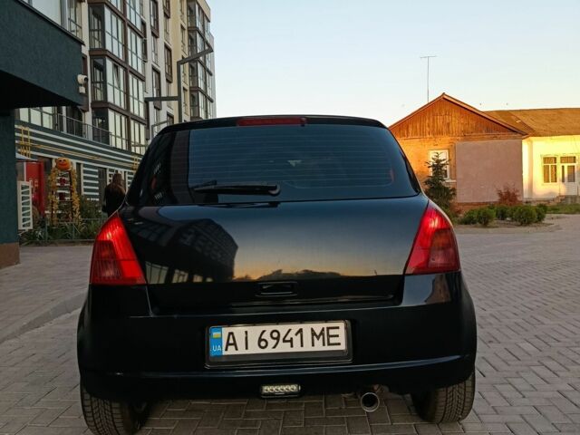 Чорний Сузукі Свифт, об'ємом двигуна 1.3 л та пробігом 220 тис. км за 4100 $, фото 1 на Automoto.ua