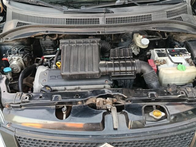 Чорний Сузукі Свифт, об'ємом двигуна 1.3 л та пробігом 220 тис. км за 4100 $, фото 10 на Automoto.ua