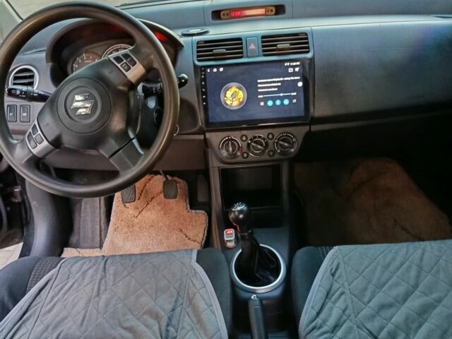 Чорний Сузукі Свифт, об'ємом двигуна 1.3 л та пробігом 220 тис. км за 4100 $, фото 4 на Automoto.ua
