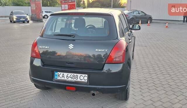 Чорний Сузукі Свифт, об'ємом двигуна 1.33 л та пробігом 117 тис. км за 4400 $, фото 6 на Automoto.ua