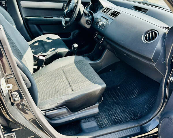 Чорний Сузукі Свифт, об'ємом двигуна 1.33 л та пробігом 229 тис. км за 3799 $, фото 23 на Automoto.ua