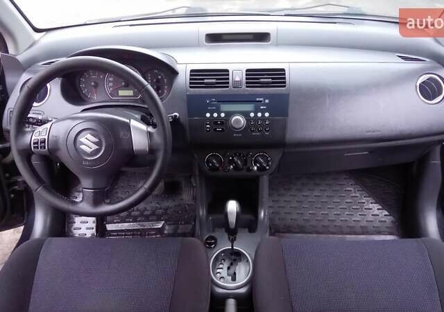 Черный Сузуки Свифт, объемом двигателя 1.49 л и пробегом 146 тыс. км за 5000 $, фото 23 на Automoto.ua