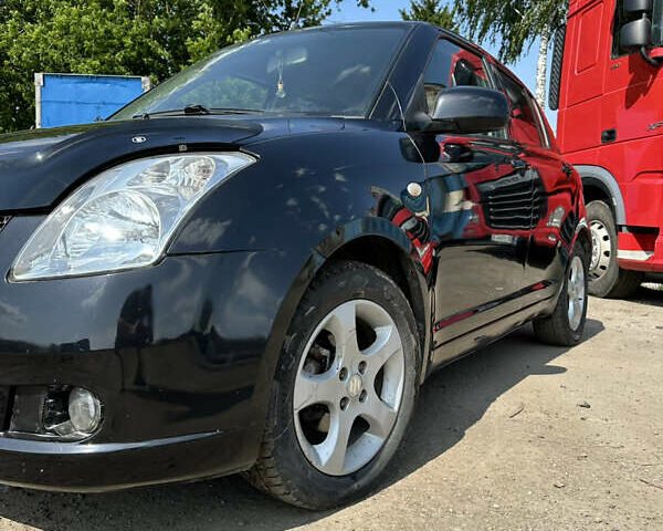 Чорний Сузукі Свифт, об'ємом двигуна 1.33 л та пробігом 229 тис. км за 3799 $, фото 11 на Automoto.ua