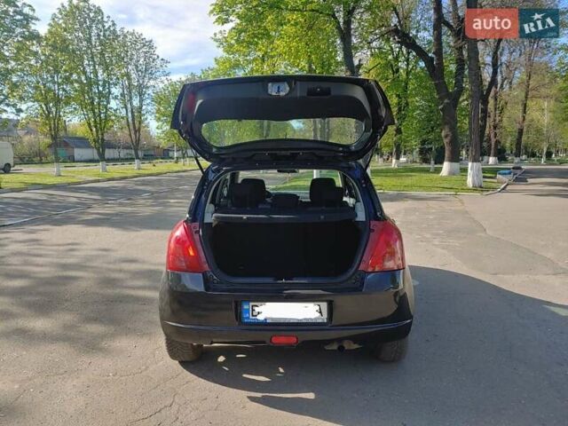 Чорний Сузукі Свифт, об'ємом двигуна 1.3 л та пробігом 152 тис. км за 5500 $, фото 7 на Automoto.ua